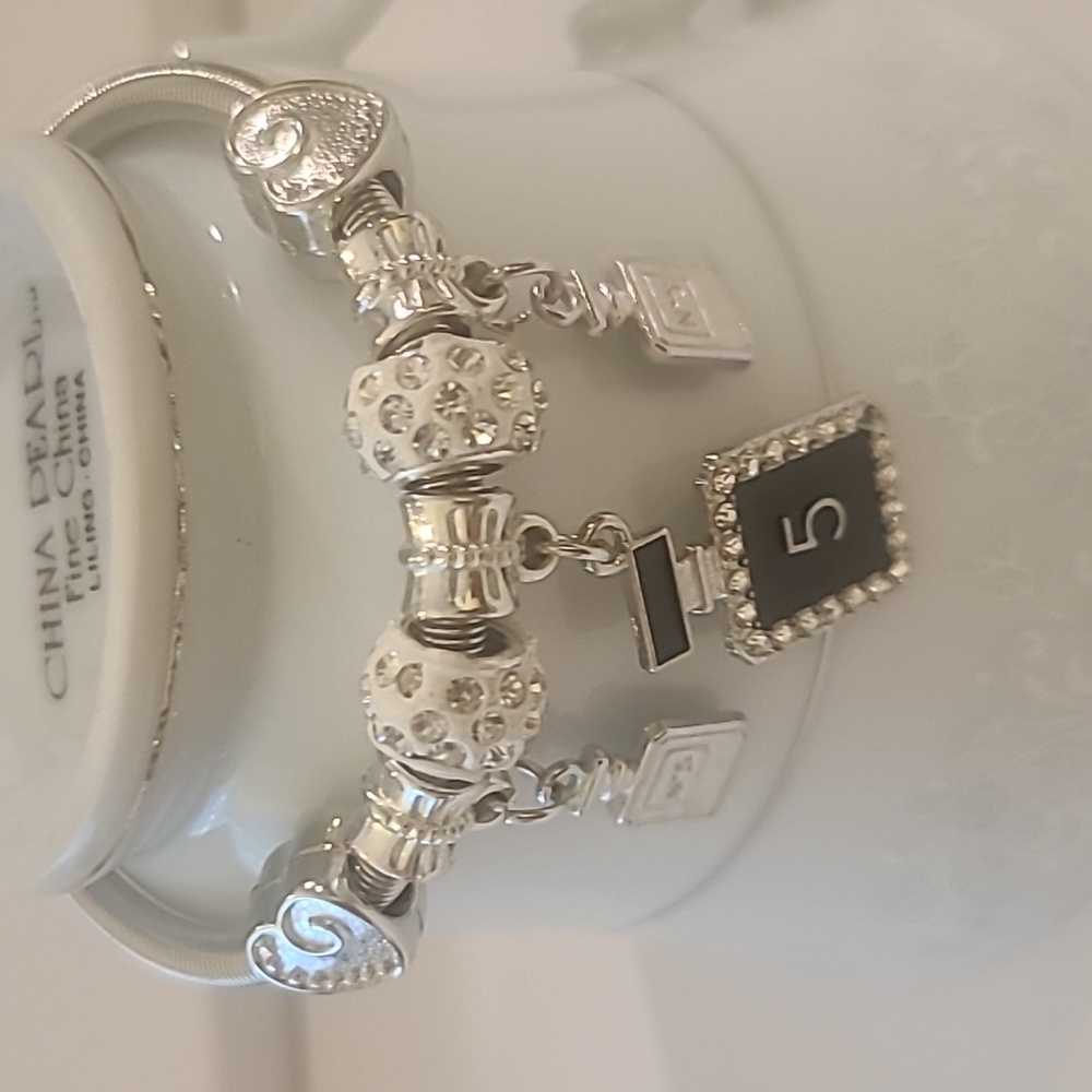 Stretch Braclet with Charms and Iconic Logo